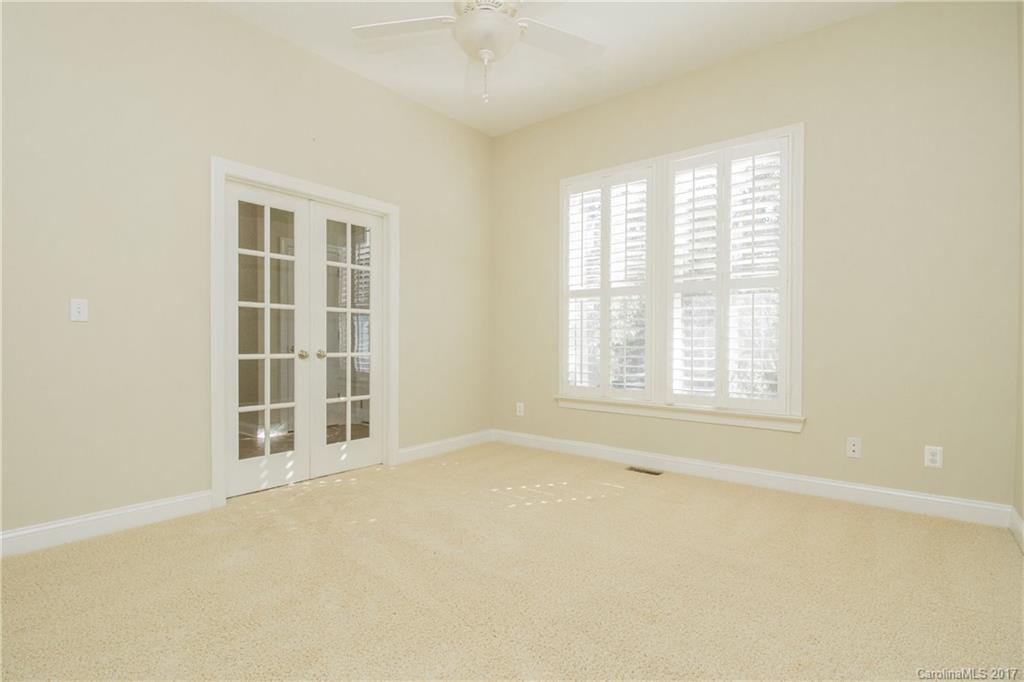 874 Promenade Walk, Unit 680 Fort Mill, SC 29708 - Photo 4 of 21 an empty room with a window