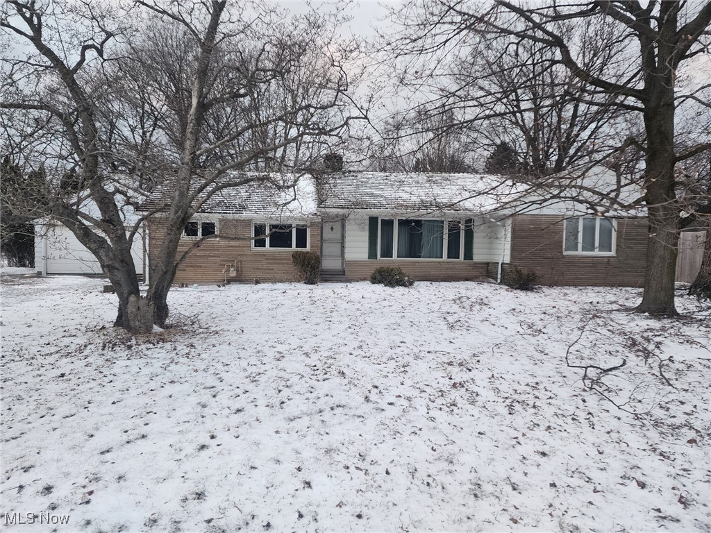 7516 Mayfield Road Chesterland, OH 44026 - Photo 1 of 21 Single story home with brick siding