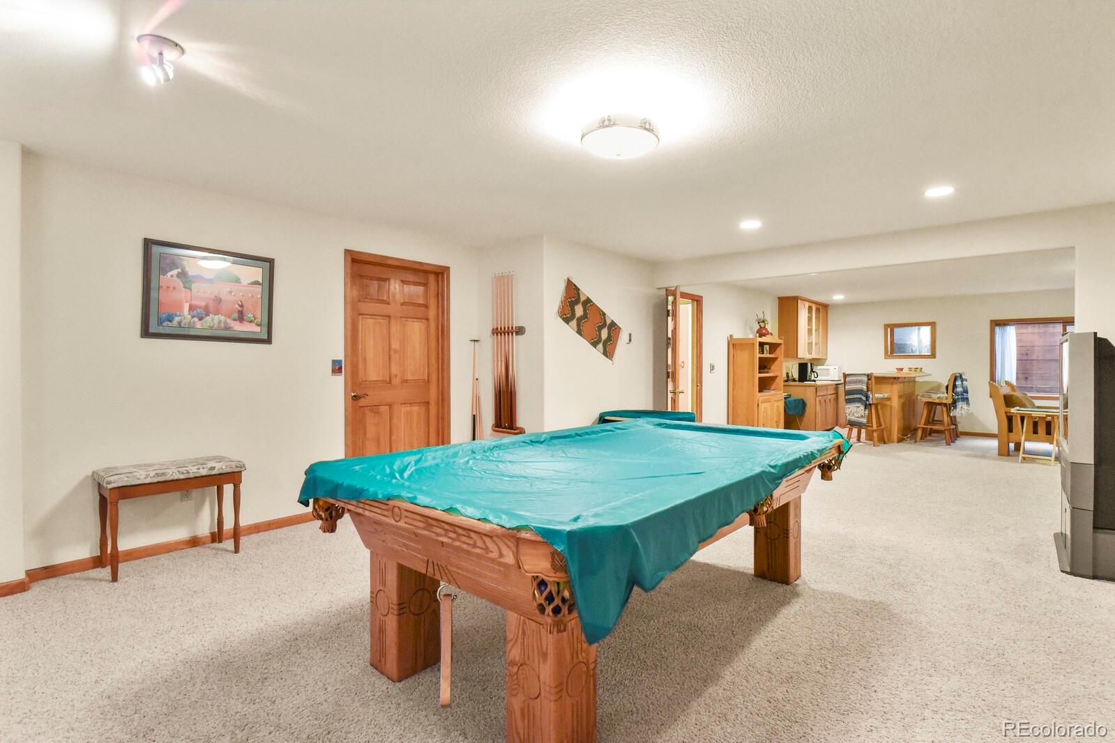 19085 Merry Men Circle Monument, CO 80132 - Photo 31 of 50 a room with pool table and windows