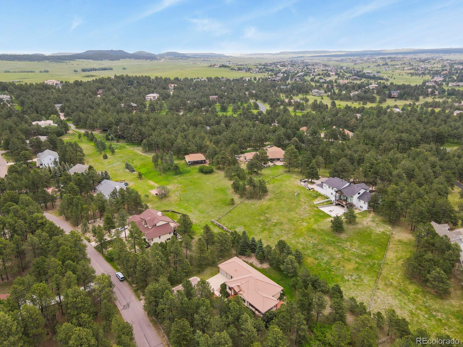 19085 Merry Men Circle Monument, CO 80132 - Photo 45 of 50 an aerial view of residential houses with outdoor space