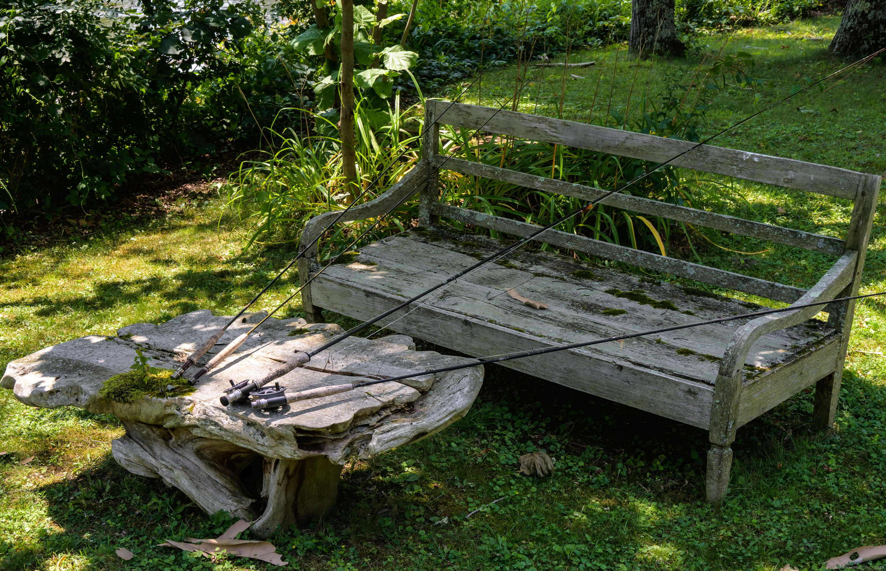 35 Kirk Road Sharon, CT 06796 - Photo 15 of 40 a backyard of a house with outdoor seating and green space