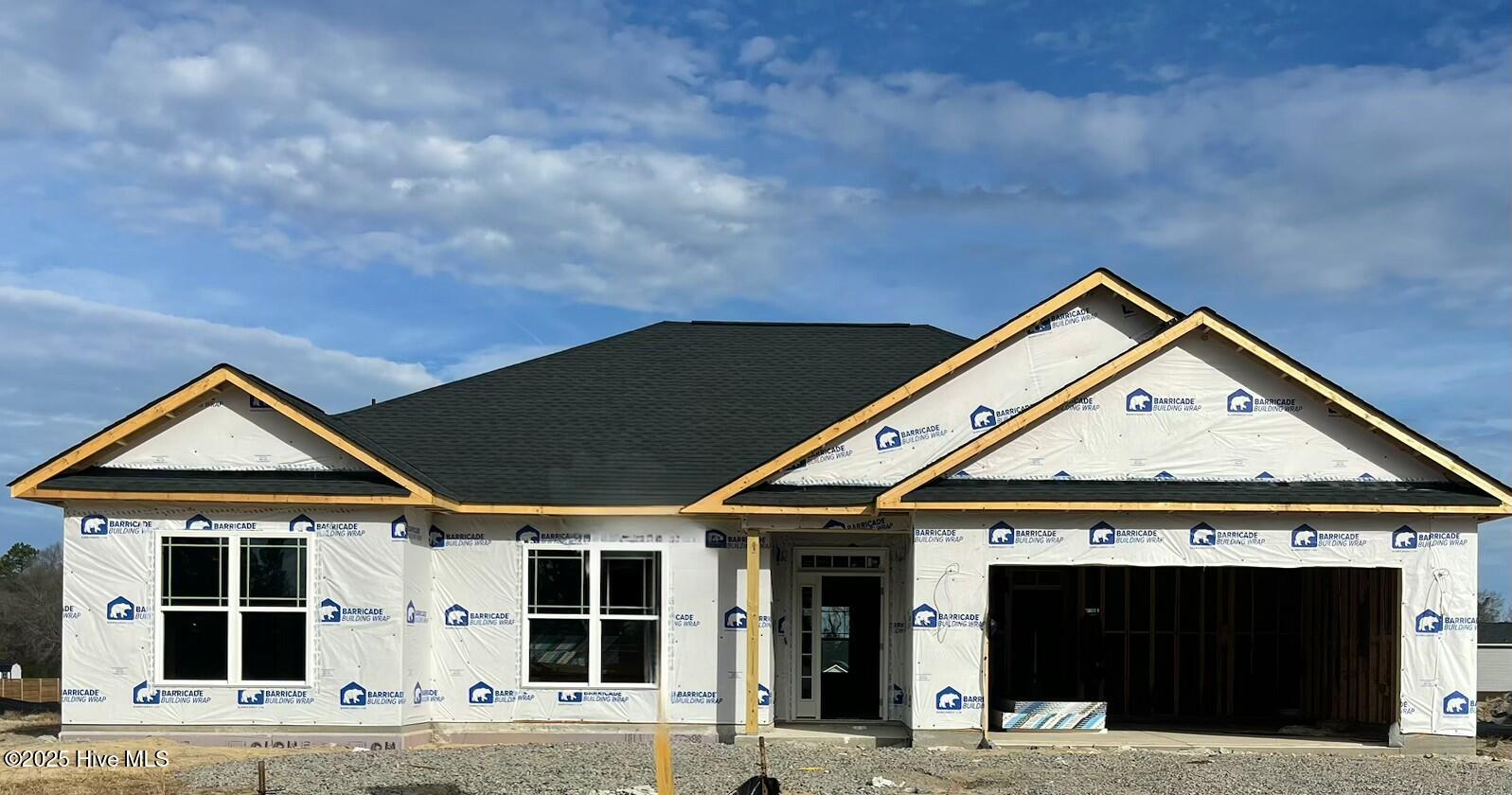 3944 Fletcher Road, Unit LOT 178 Bailey, NC 27807 - Photo 1 of 23 1707s/f, 3br, 2b, covered porch, laundry room, dining/kitchen combination, fireplace w/logs