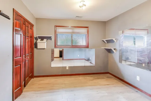 a view of kitchen and front door