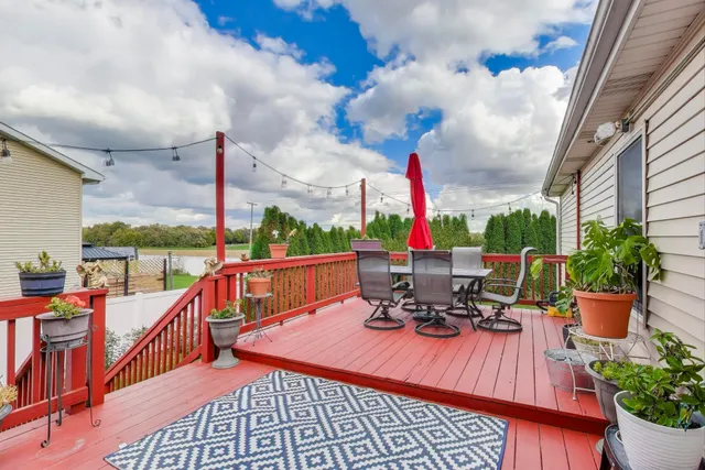 a view of a balcony with chairs