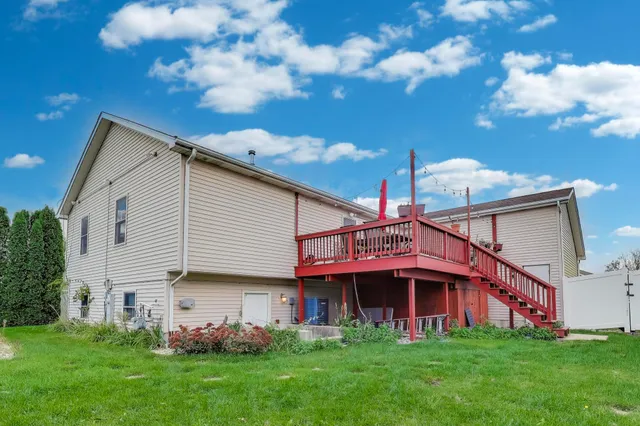 a view of a house with a yard balcony