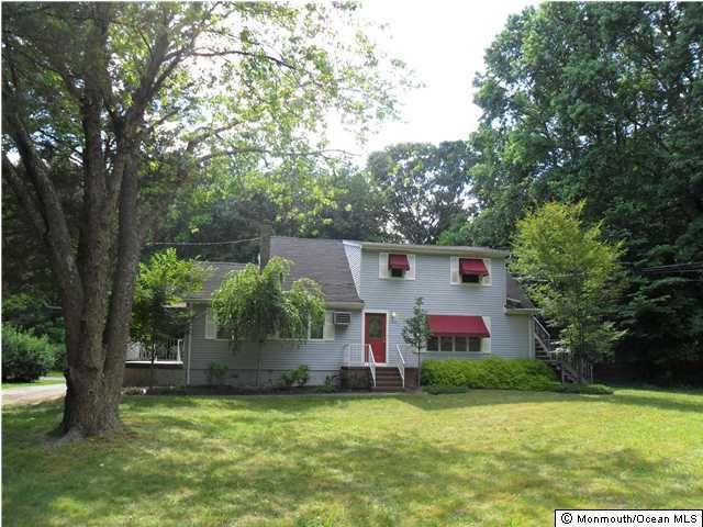634 Fort Plains Road Howell, NJ 07731 - Photo 1 of 14 a view of a house with backyard and garden