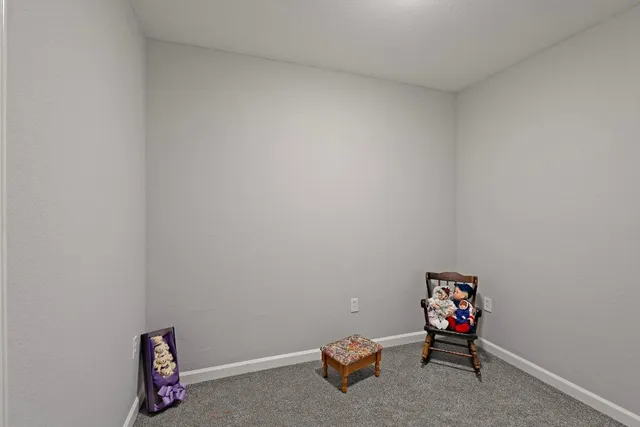 a room with toys and a wooden floor