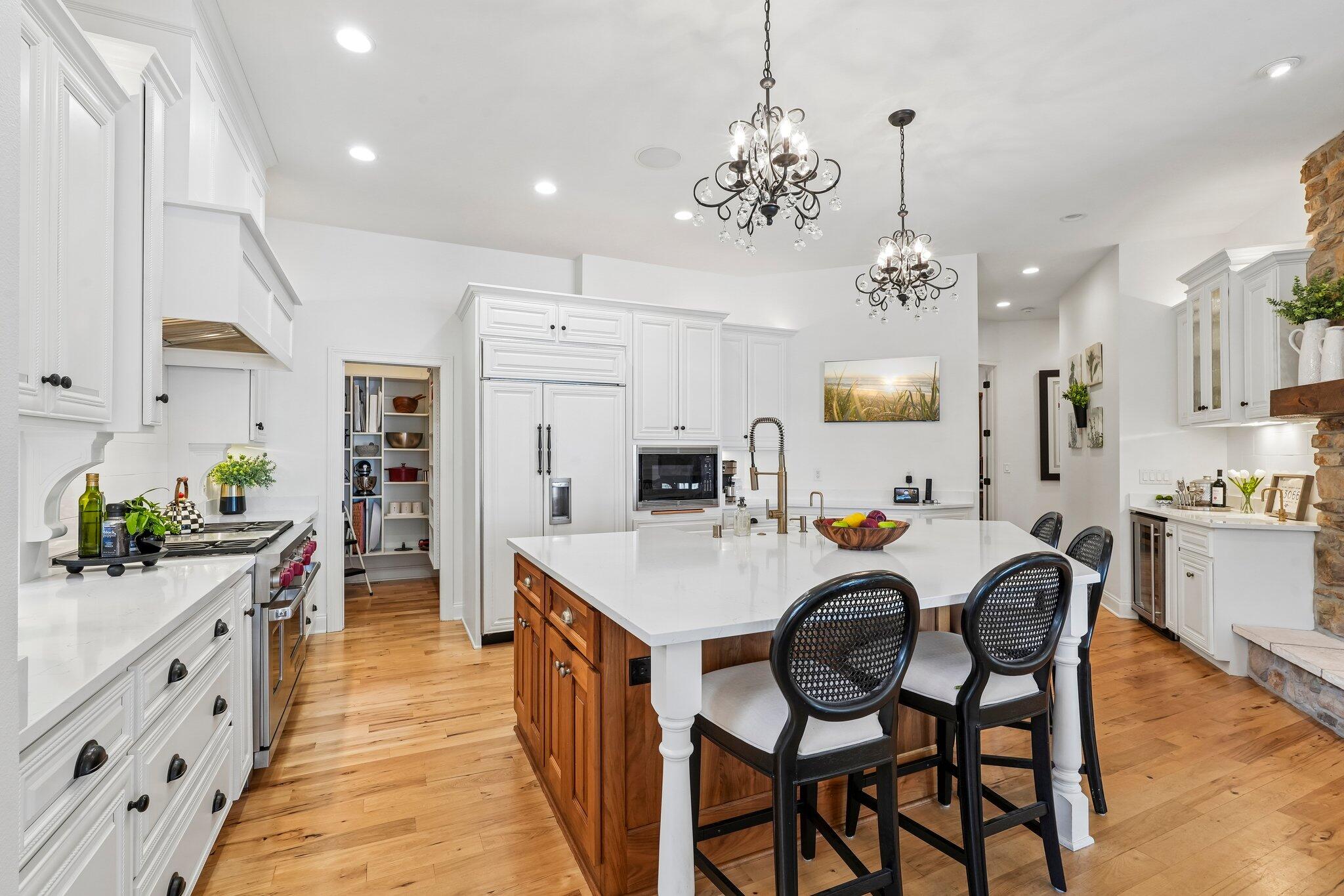 W343N6293 South Bayview Road Oconomowoc, WI 53066 - Photo 38 of 104 Gourmet kitchen with massive island