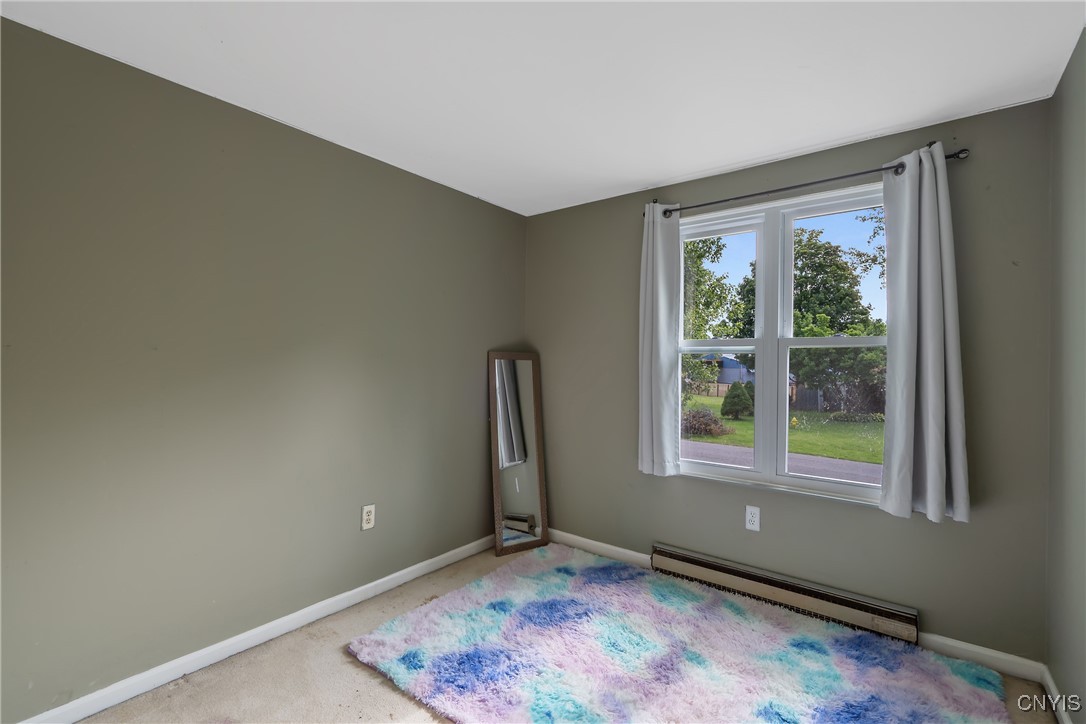 9582 Tagus Lane Cicero, NY 13029 - Photo 13 of 30 Here is the first of three bedrooms on this level.