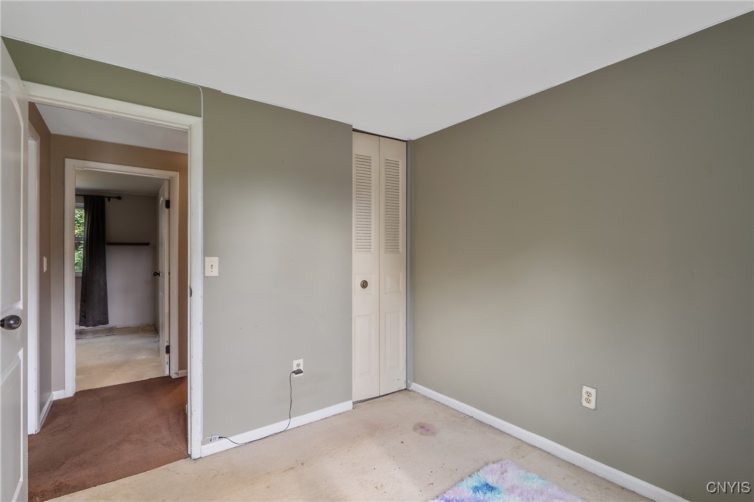 9582 Tagus Lane Cicero, NY 13029 - Photo 14 of 30 The opposite wall shows us the closet tucked into