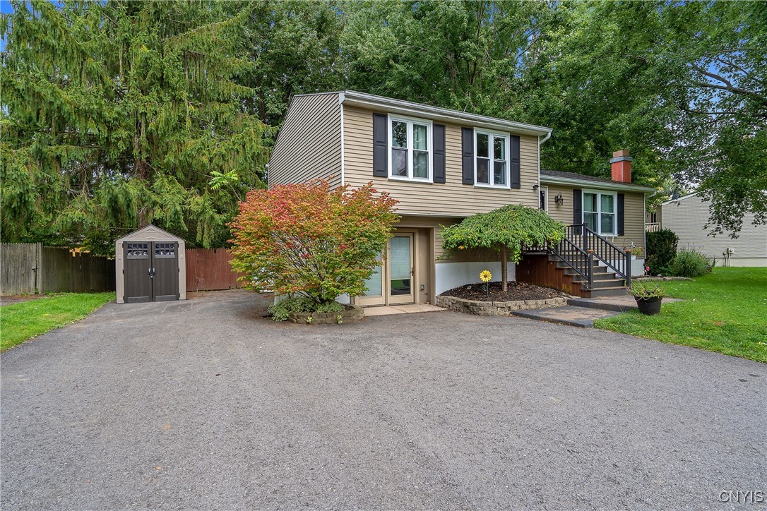 9582 Tagus Lane Cicero, NY 13029 - Photo 2 of 30 The triple-wide driveway can accommodate a small f