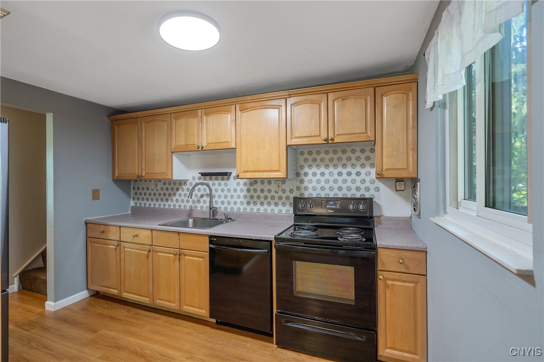 9582 Tagus Lane Cicero, NY 13029 - Photo 10 of 30 Lots of storage and prep space with the wall of ca