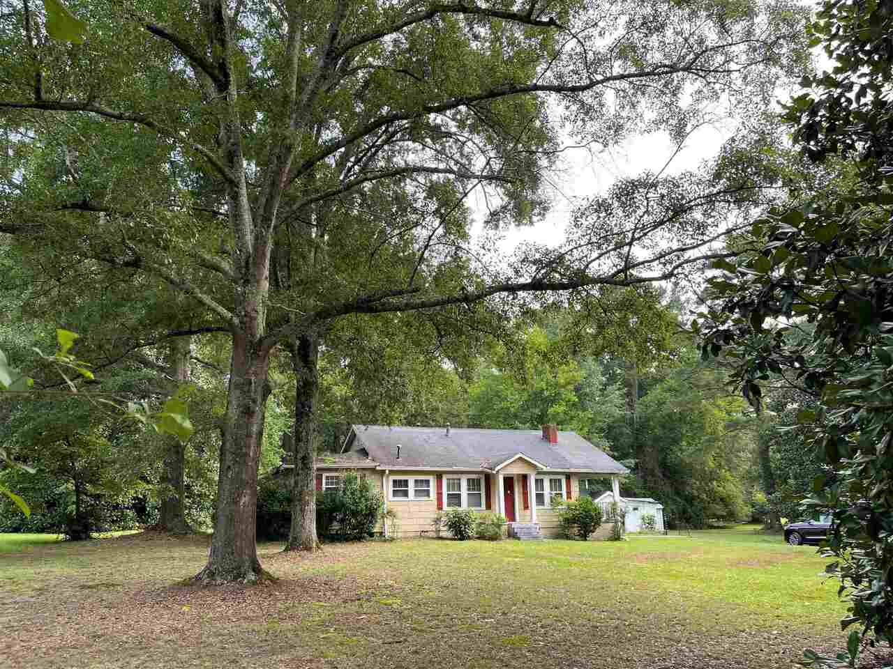 1326 Horseleg Creek Road Southwest Rome, GA 30165 - Photo 1 of 1 a front view of a house with a yard