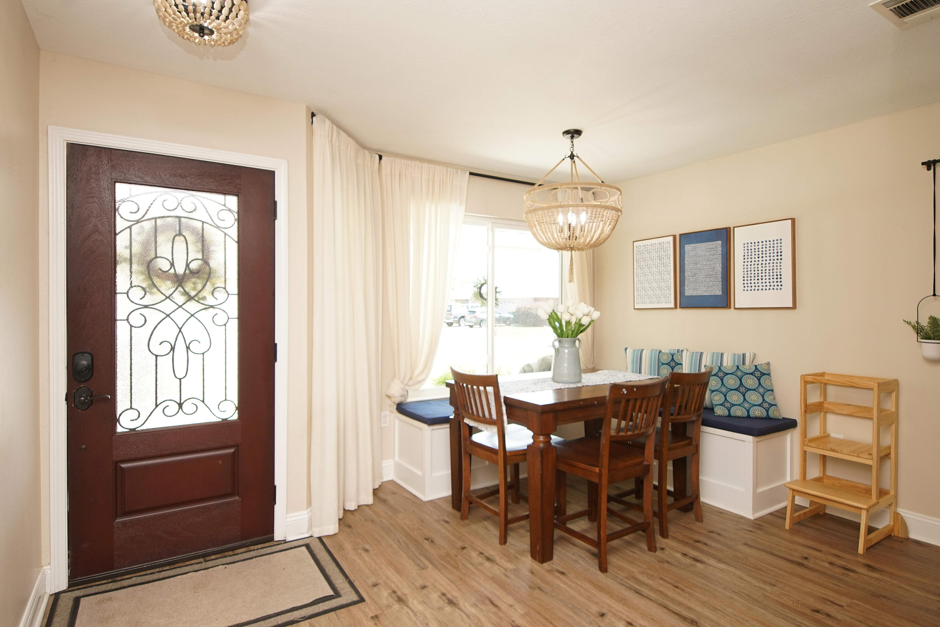 3912 Mesa Road Destin, FL 32541 - Photo 12 of 44 a view of a a dining room with furniture window and wooden floor