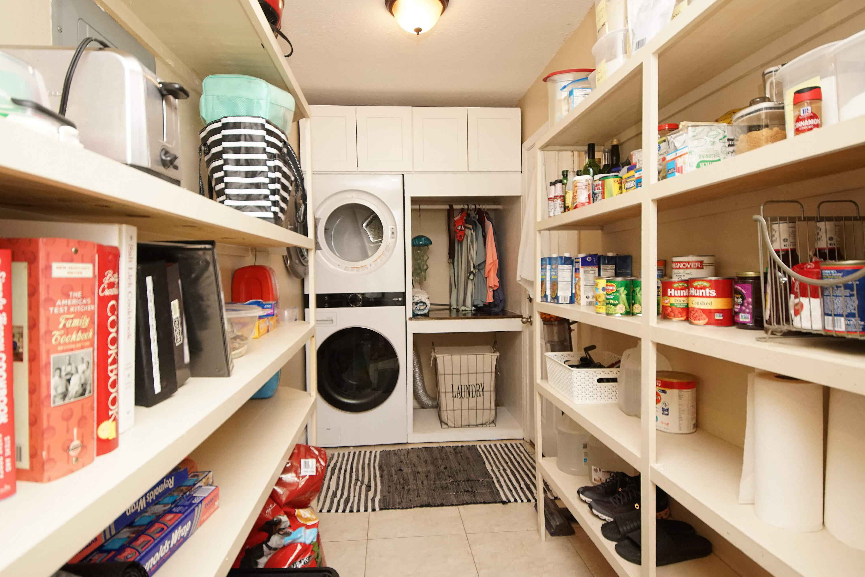 3912 Mesa Road Destin, FL 32541 - Photo 18 of 44 a utility room with dryer and washer