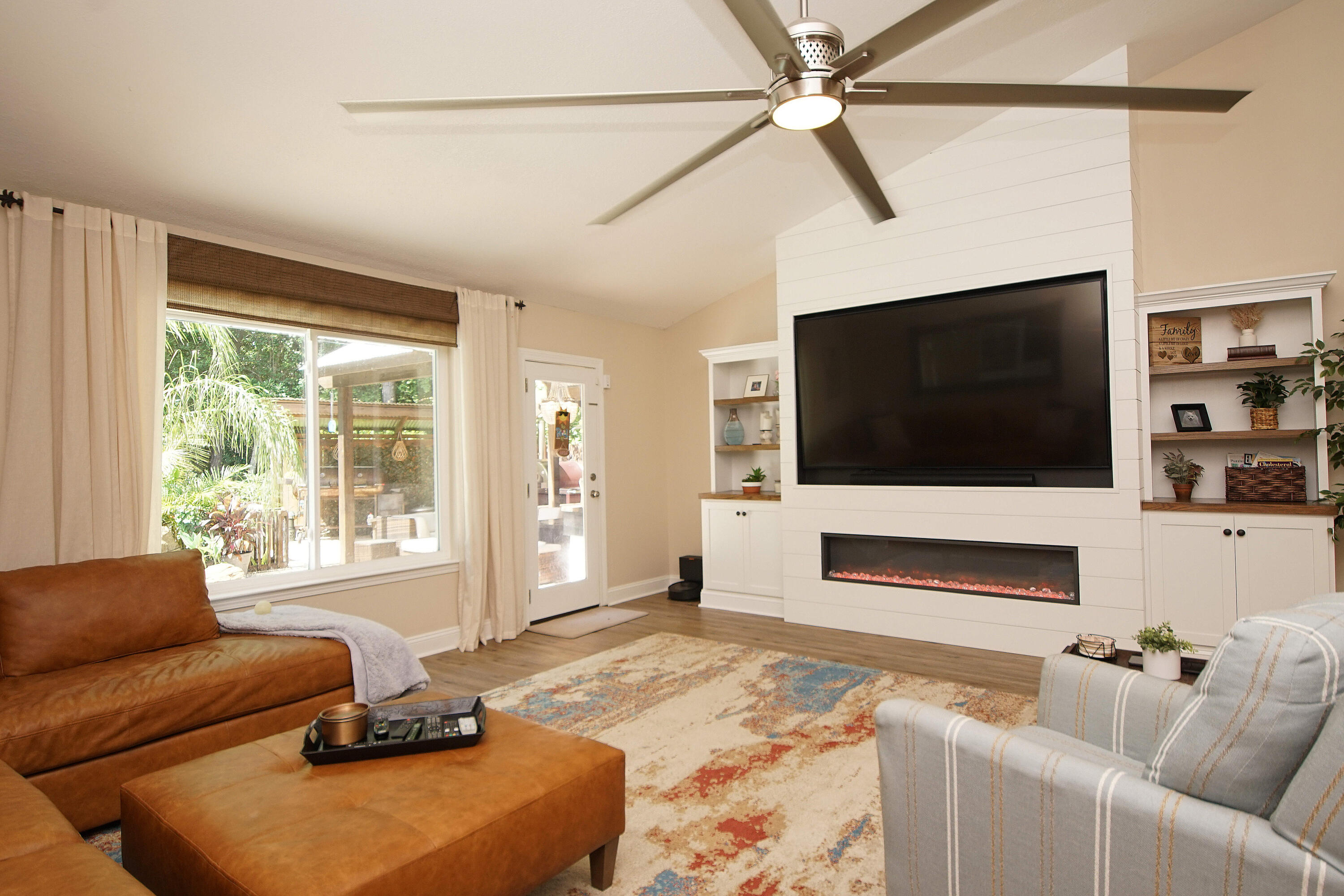 3912 Mesa Road Destin, FL 32541 - Photo 21 of 44 a living room with furniture and a flat screen tv