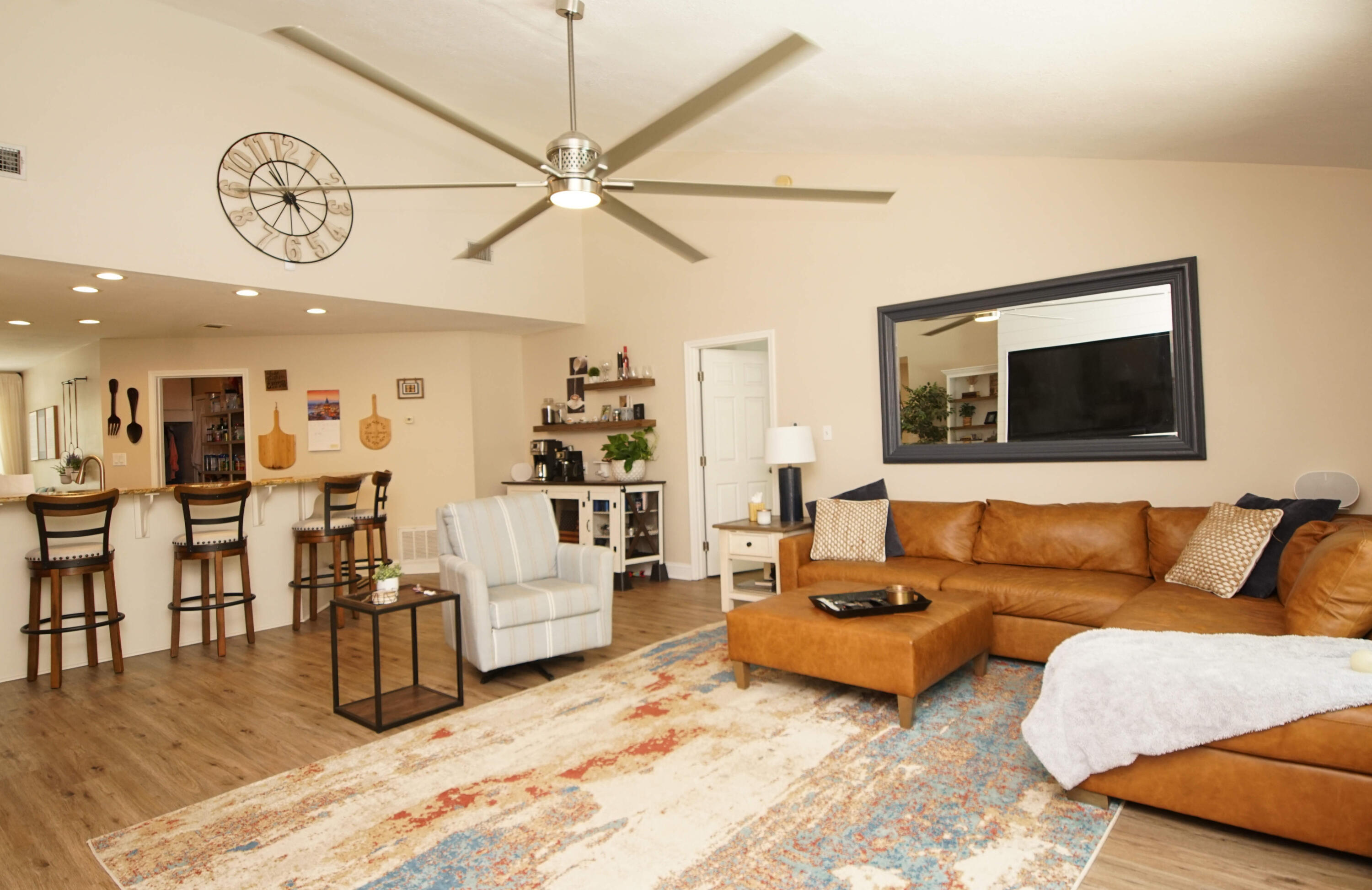 3912 Mesa Road Destin, FL 32541 - Photo 22 of 44 a living room with furniture and a flat screen tv