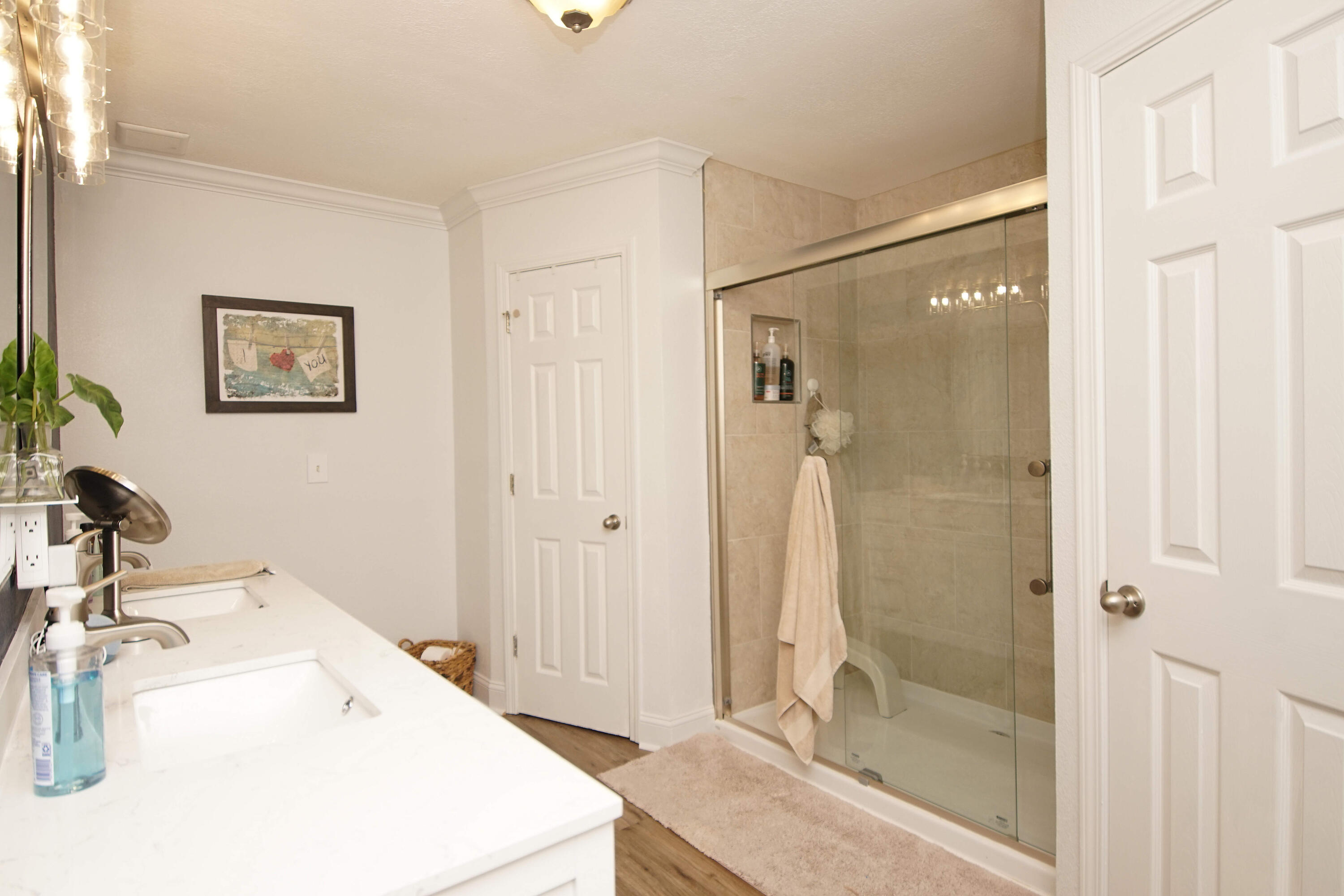 3912 Mesa Road Destin, FL 32541 - Photo 27 of 44 a bathroom with a sink and a mirror