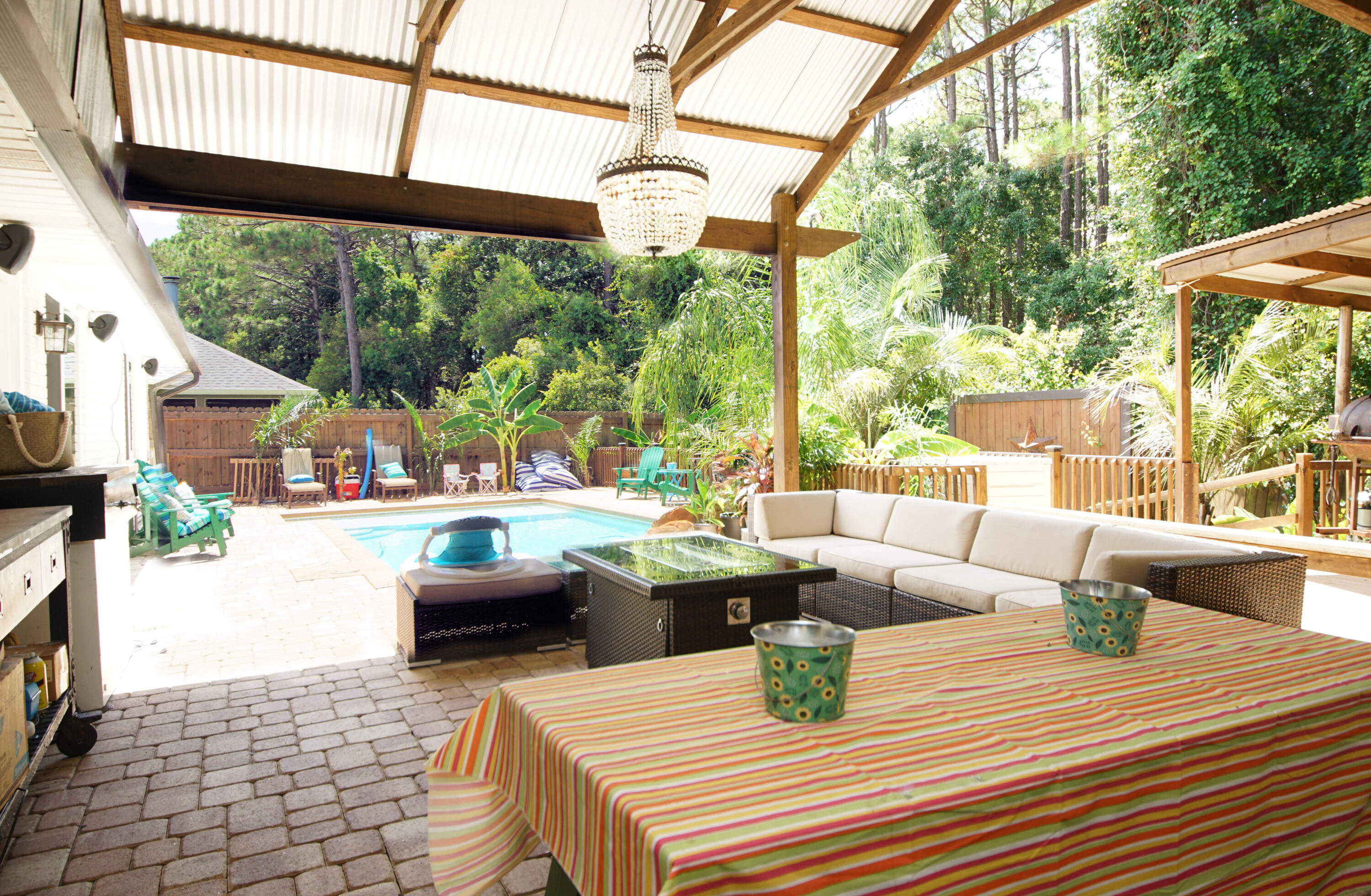 3912 Mesa Road Destin, FL 32541 - Photo 3 of 44 a outdoor space with the couches and dining table with garden view