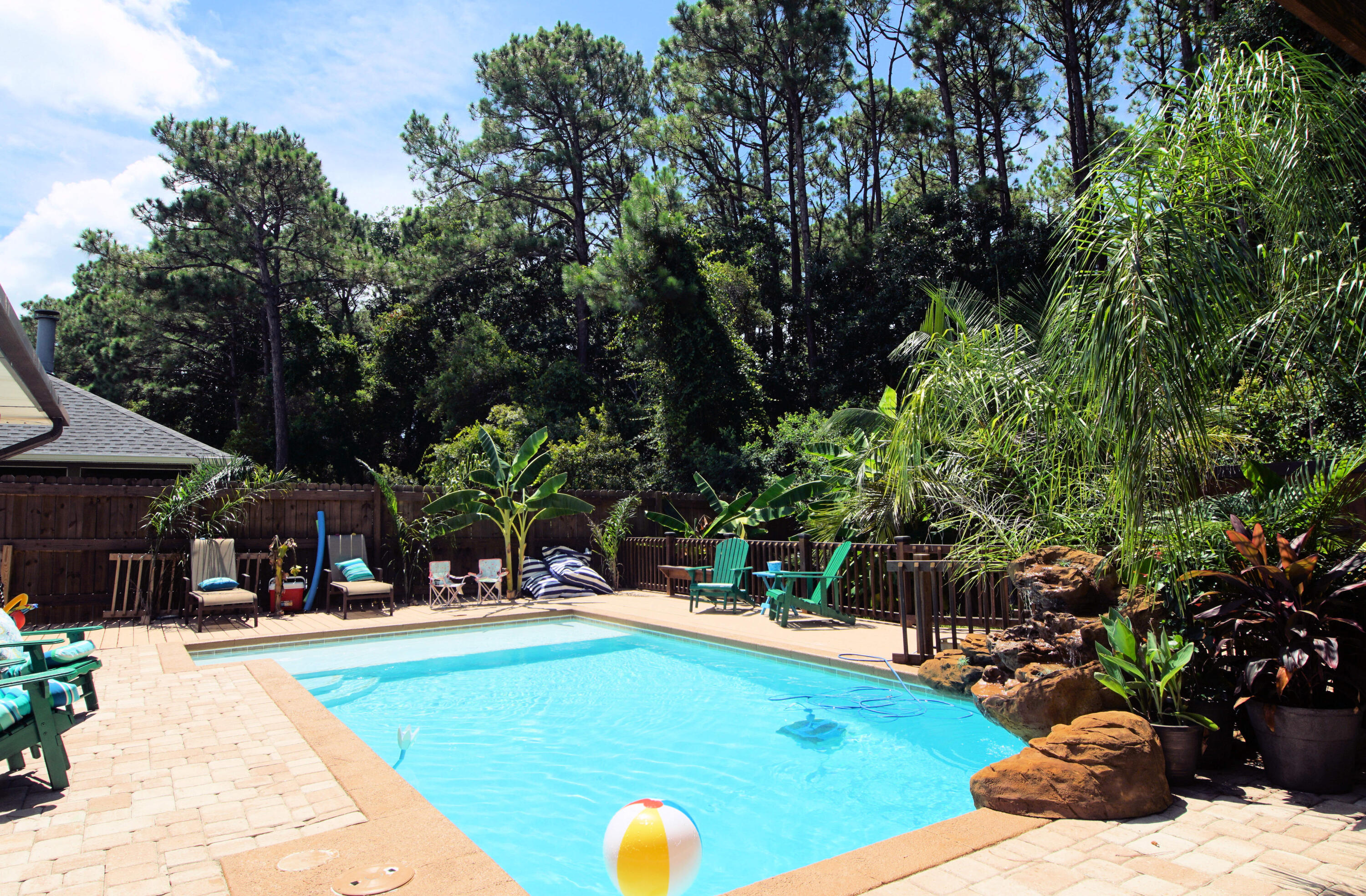 3912 Mesa Road Destin, FL 32541 - Photo 34 of 44 a view of a swimming pool with a patio