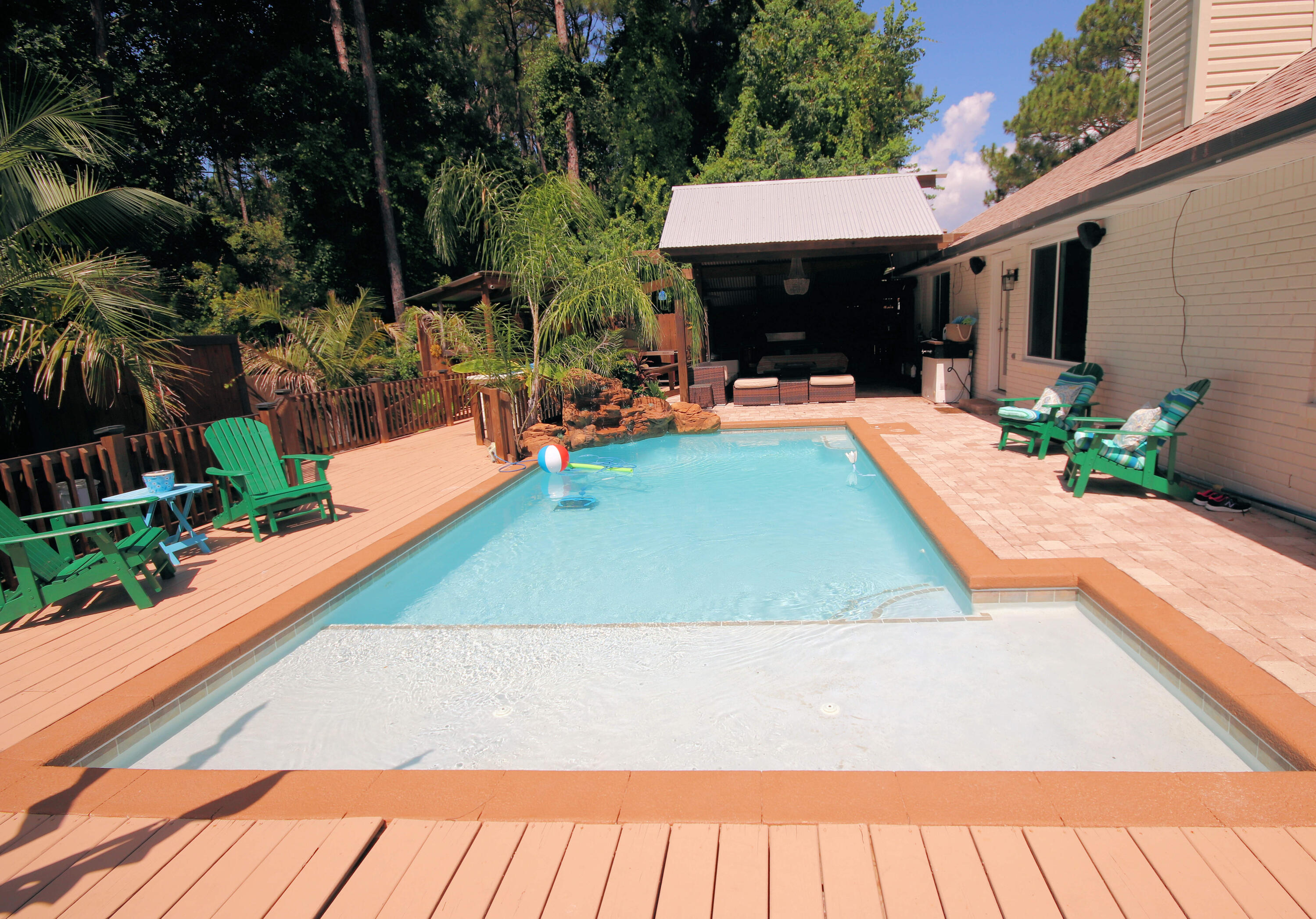3912 Mesa Road Destin, FL 32541 - Photo 37 of 44 a view of a swimming pool with a patio