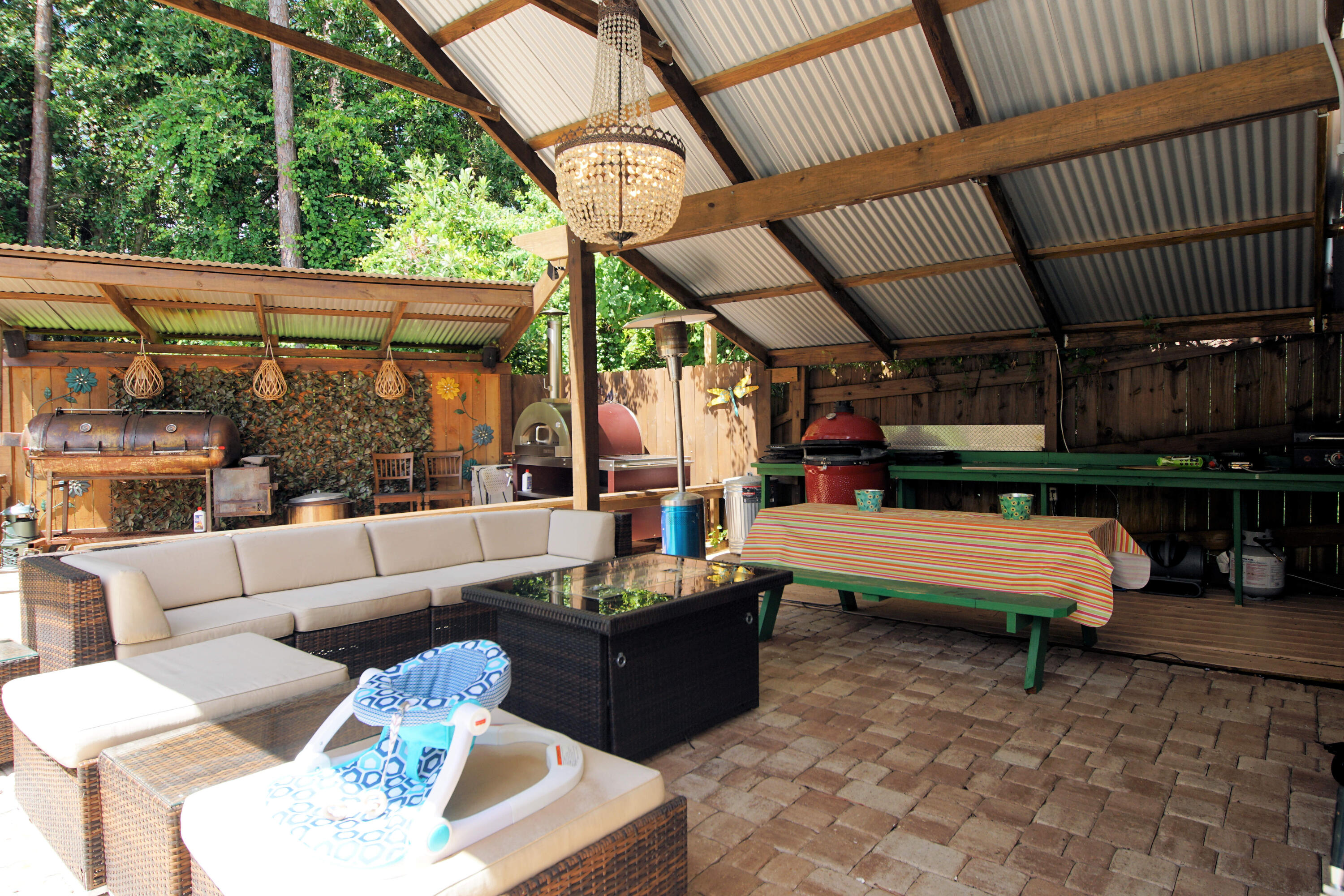 3912 Mesa Road Destin, FL 32541 - Photo 4 of 44 a outdoor living space with patio furniture and a potted plant
