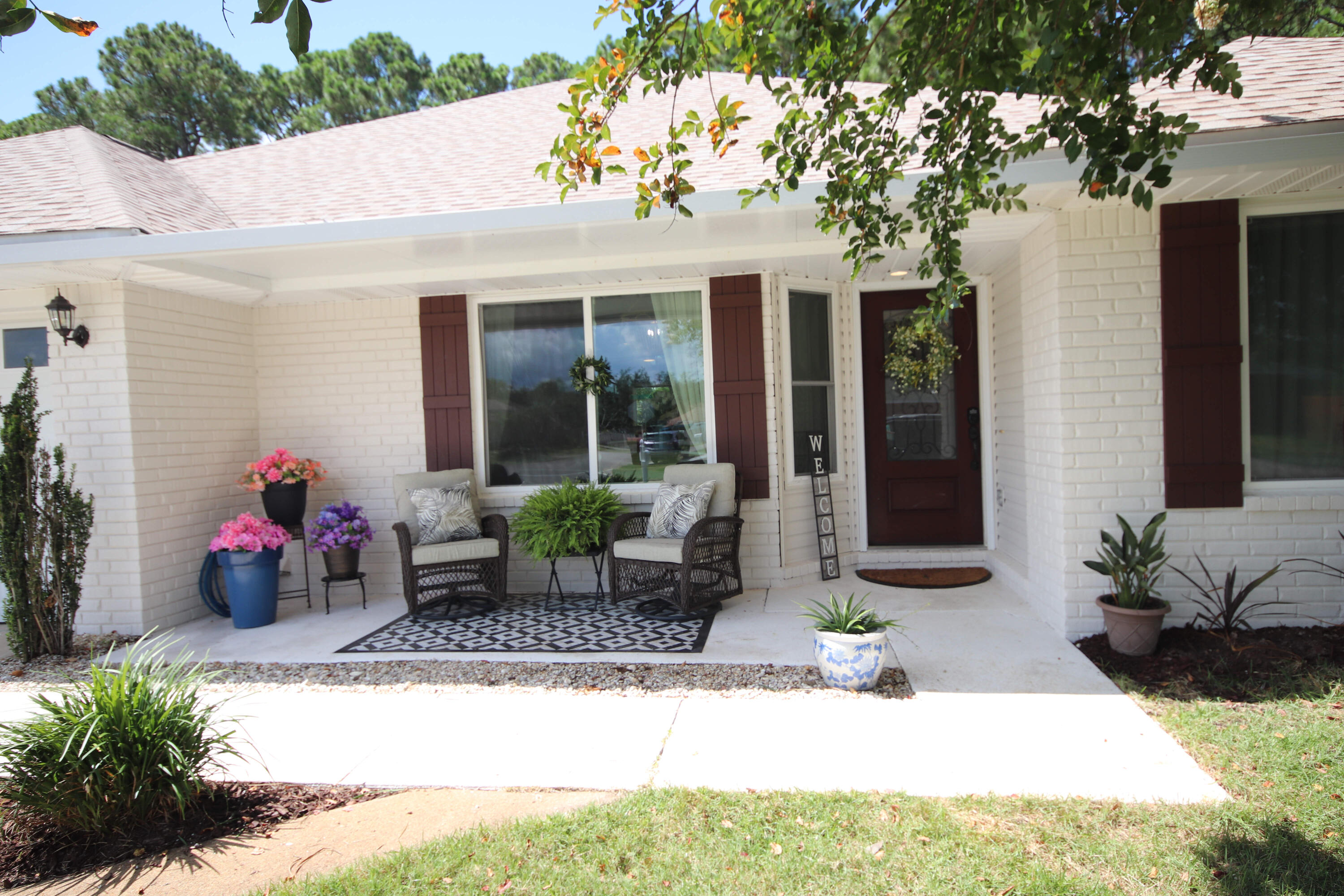 3912 Mesa Road Destin, FL 32541 - Photo 7 of 44 a view of a house with potted plants