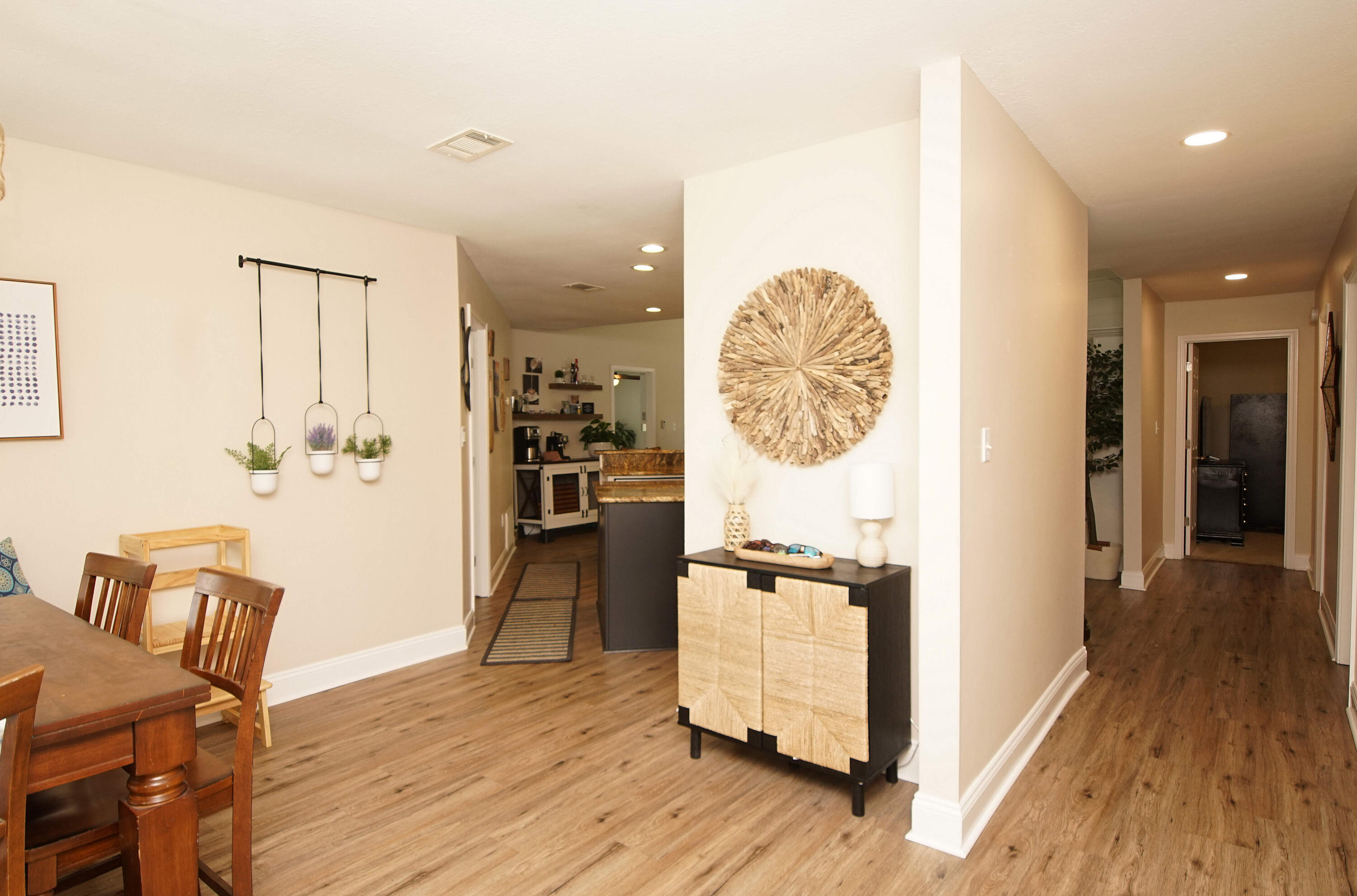 3912 Mesa Road Destin, FL 32541 - Photo 10 of 44 a view of a hallway with wooden floor