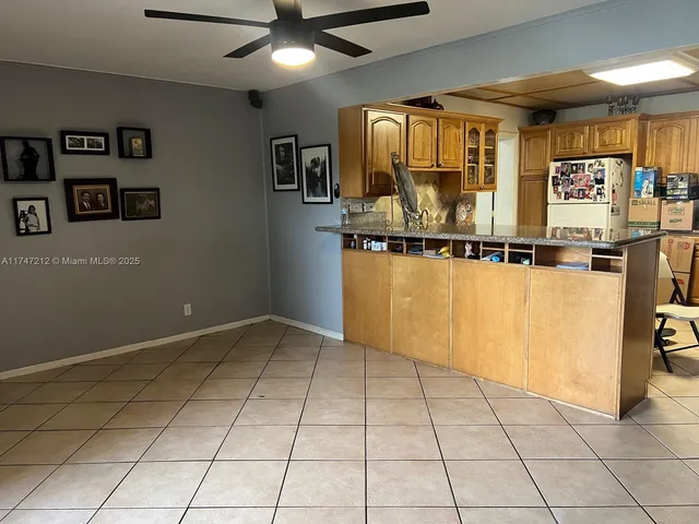 a view of a livingroom with wooden floor