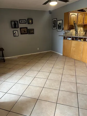 a view of a livingroom with wooden floor