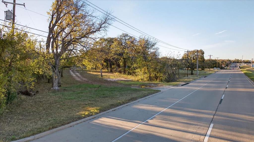 936 Southeast Parkway Azle, TX 76020 - Photo 2 of 14 View of concrete street with curbs