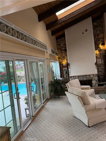 a view of a chairs and table in backyard