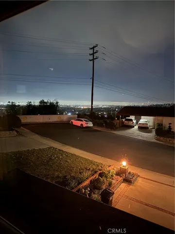 a view of a livingroom with furniture and a fireplace