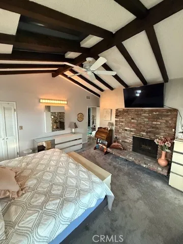 a living room filled with furniture and a window