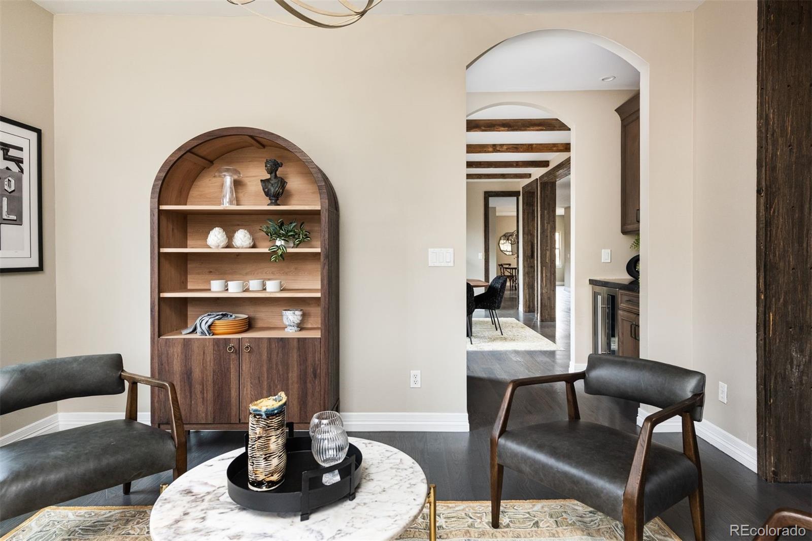 1214 South Fillmore Street Denver, CO 80210 - Photo 13 of 50 a living room with furniture a dining table and a window