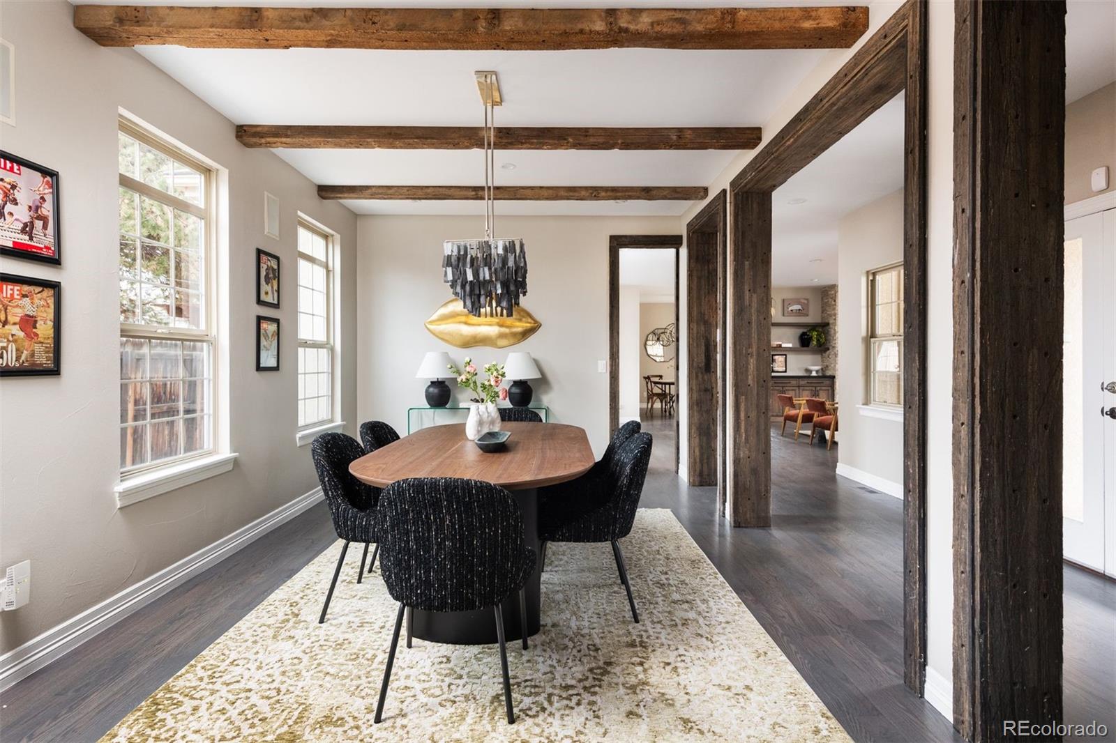 1214 South Fillmore Street Denver, CO 80210 - Photo 20 of 50 a view of a dining room with furniture window and wooden floor