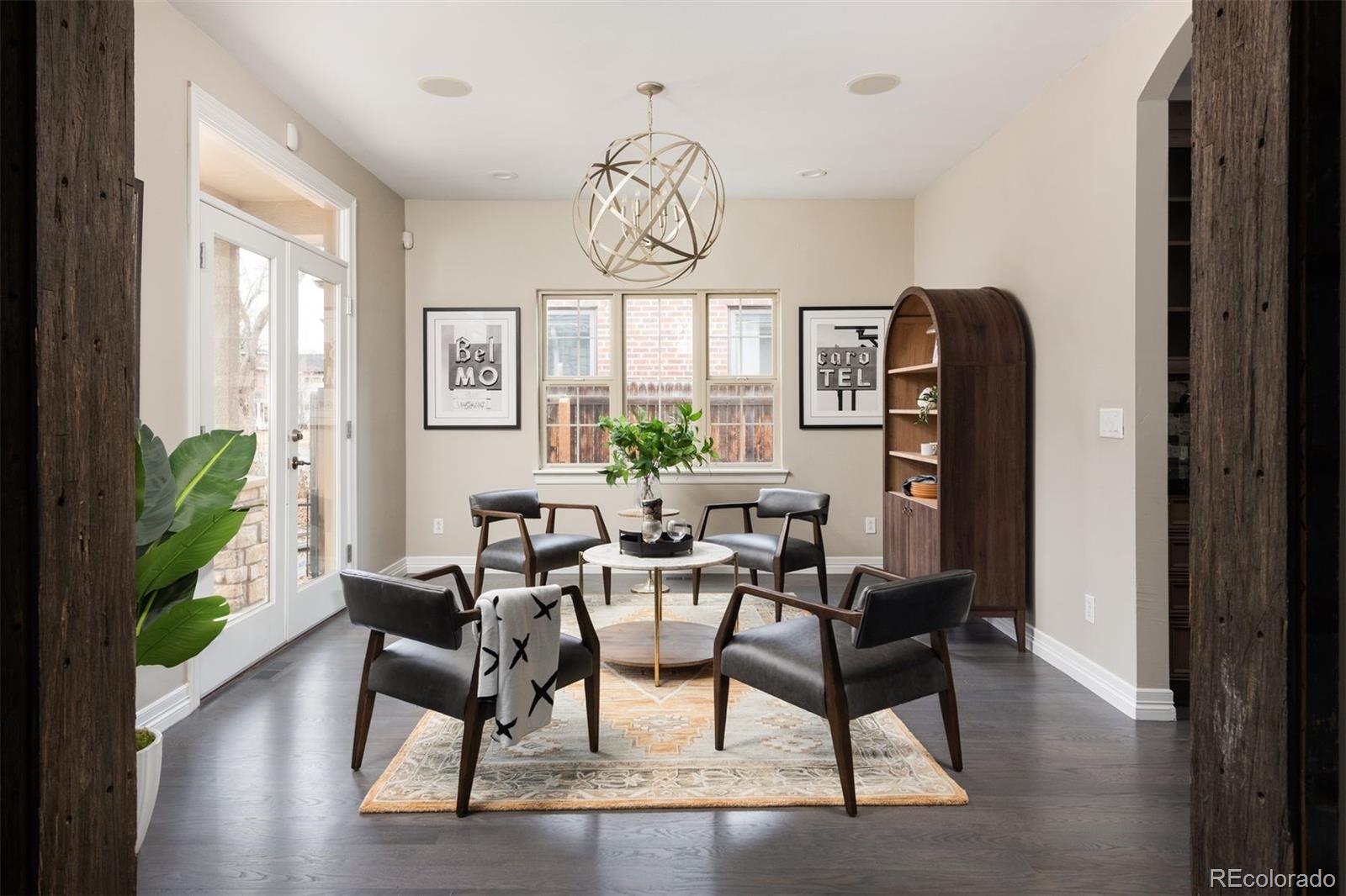 1214 South Fillmore Street Denver, CO 80210 - Photo 2 of 50 a view of a dining room with furniture window and wooden floor