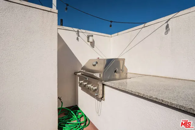 a view of a balcony with an outdoor space