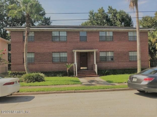 3126 Belden Circle, Unit 2 Jacksonville, FL 32207 - Photo 1 of 13 a house that has a lot of windows in it