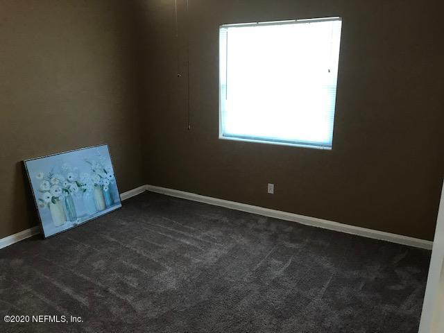 3126 Belden Circle, Unit 2 Jacksonville, FL 32207 - Photo 11 of 13 a view of an empty room with a window