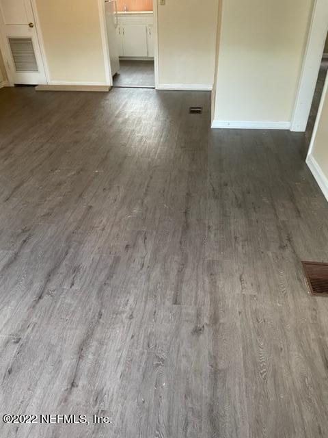 3126 Belden Circle, Unit 2 Jacksonville, FL 32207 - Photo 2 of 13 a view of a livingroom with wooden floor