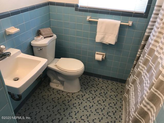 3126 Belden Circle, Unit 2 Jacksonville, FL 32207 - Photo 10 of 13 a bathroom with a toilet and a sink