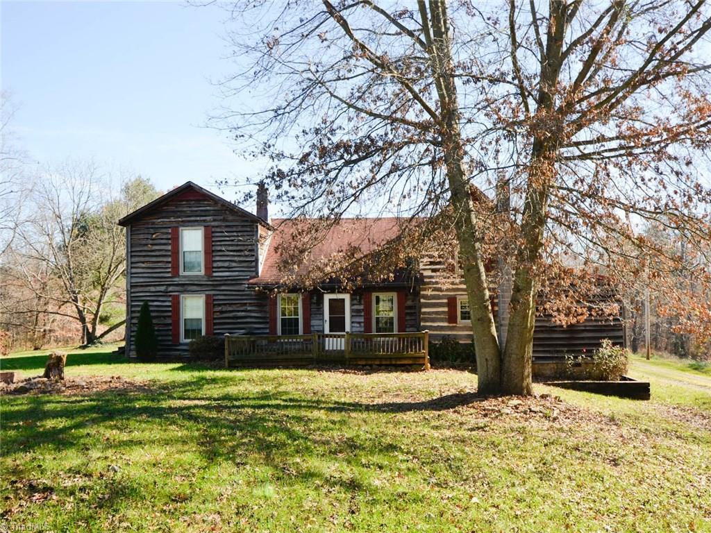 171 Guy Gaither Road Harmony, NC 28634 - Photo 1 of 21 Beautiful log cabin home ready to be your next retreat or cozy spot to return after a long days work!