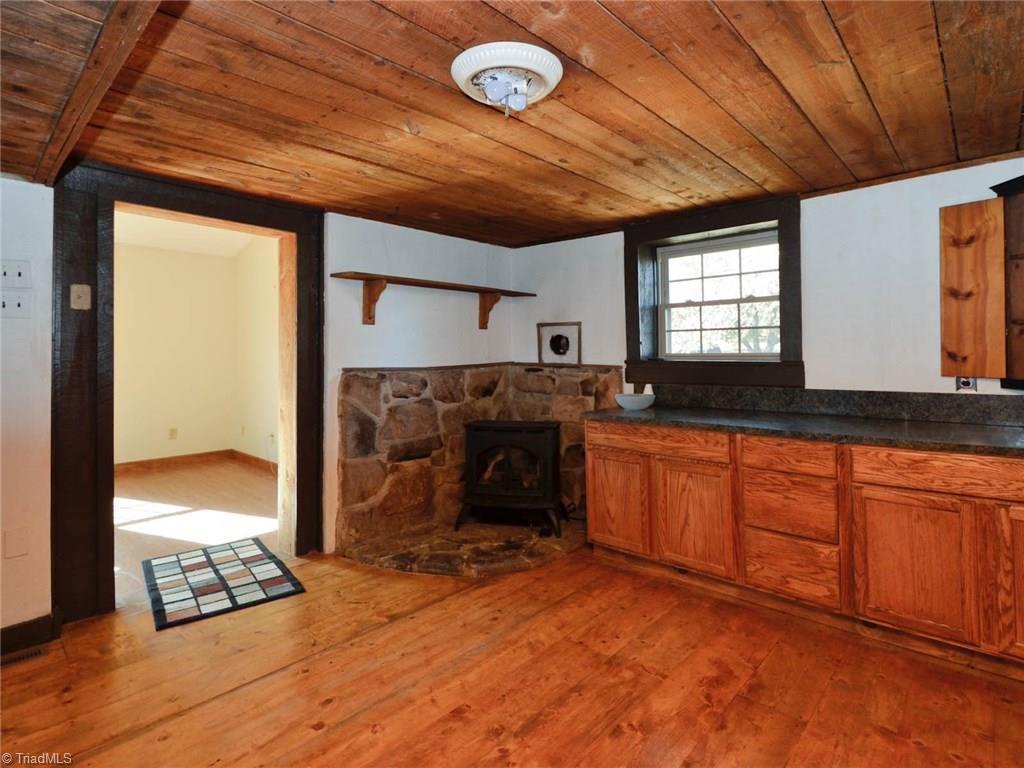 171 Guy Gaither Road Harmony, NC 28634 - Photo 12 of 21 Plenty of room to cook in this kitchen! Take notice of all the character this kitchen has to offer. Plenty of room for a kitchen island if one desires.