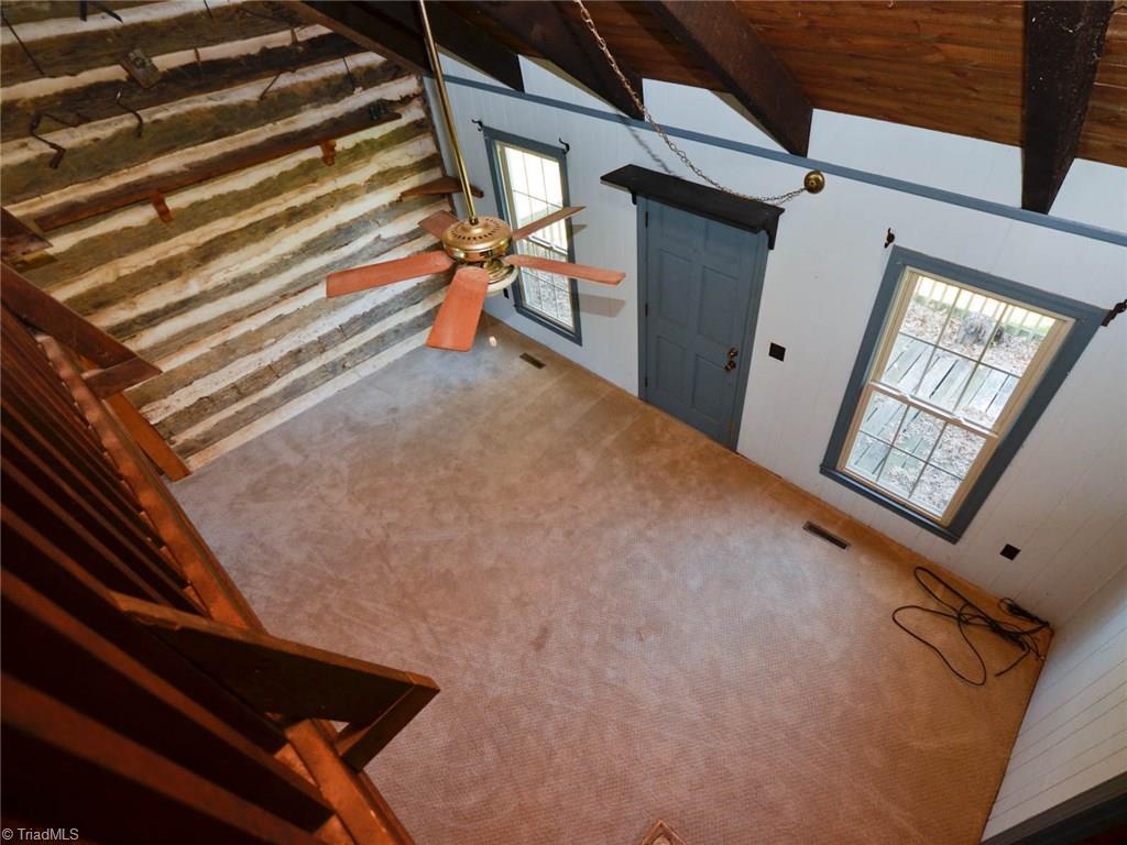 171 Guy Gaither Road Harmony, NC 28634 - Photo 9 of 21 View from loft into the living room.