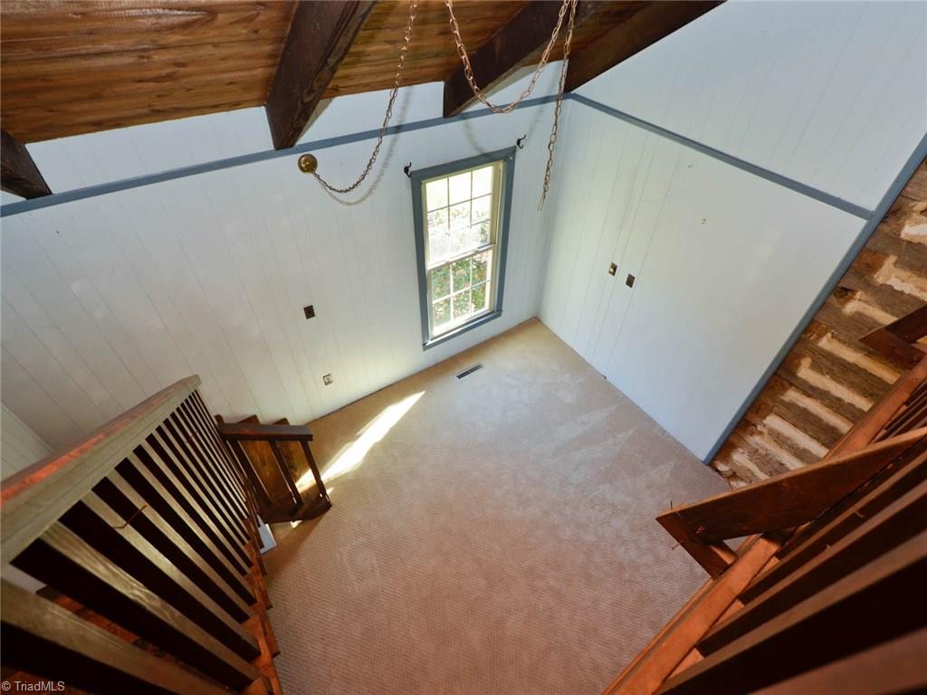 171 Guy Gaither Road Harmony, NC 28634 - Photo 10 of 21 View from loft into the dining room.