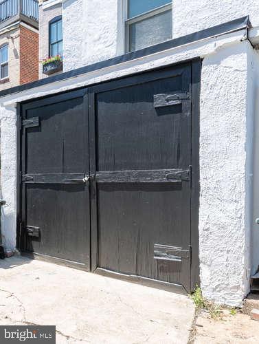 1206 T Street Northwest Washington, DC 20009 - Photo 33 of 34 Garage! Can comfortably hold a smaller car.