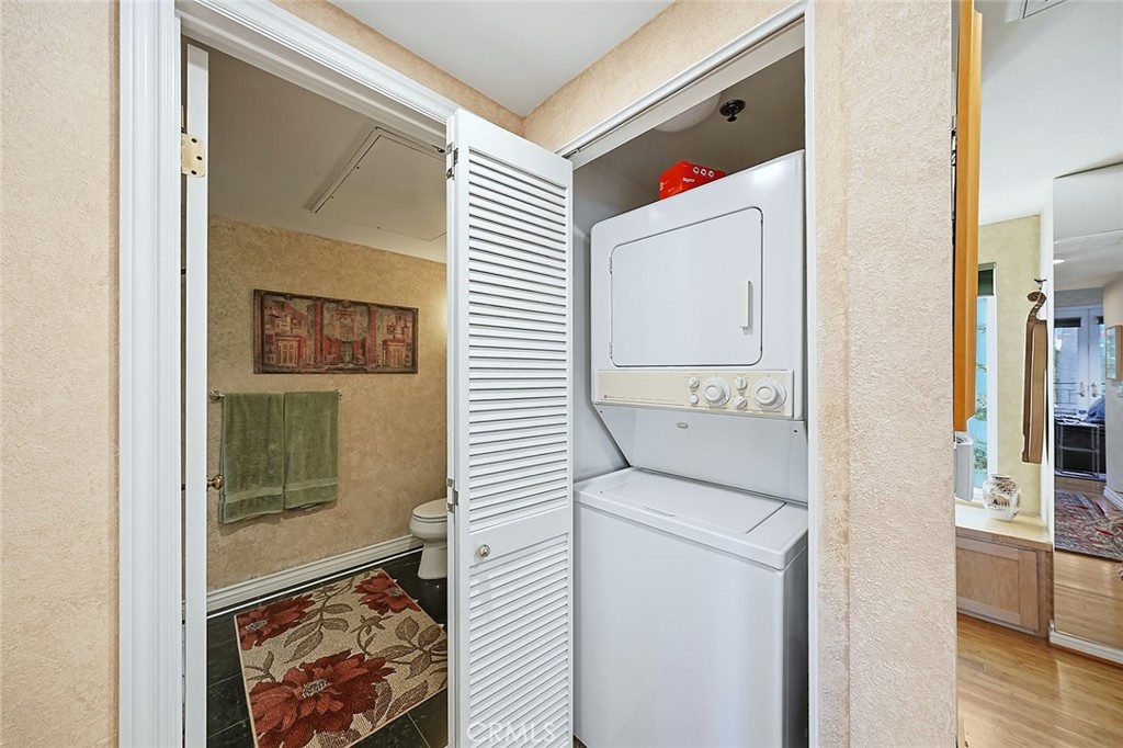 80 North Raymond Avenue, Unit 212 Pasadena, CA 91103 - Photo 18 of 24 a utility room with dryer and washer