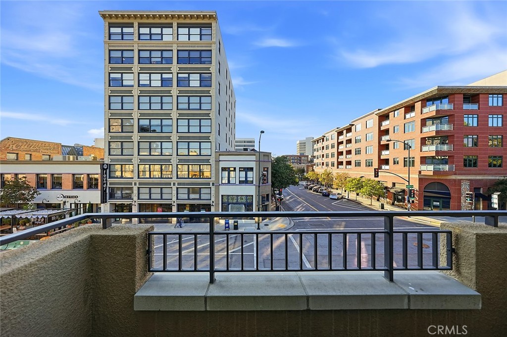 80 North Raymond Avenue, Unit 212 Pasadena, CA 91103 - Photo 19 of 24 a view of a large building from a balcony