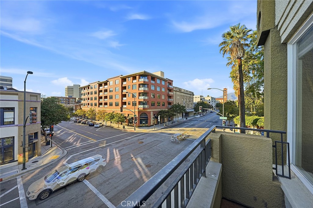 80 North Raymond Avenue, Unit 212 Pasadena, CA 91103 - Photo 20 of 24 a view of a balcony with chairs